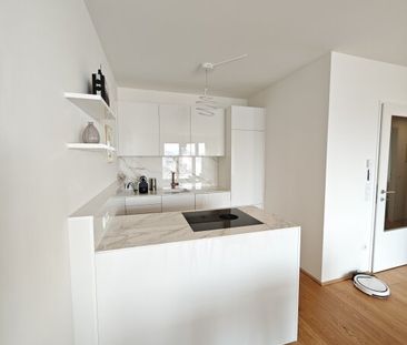 Hochwertiger Erstbezug (nahezu) mit Balkon und Fernblick, letzter L... - Photo 4