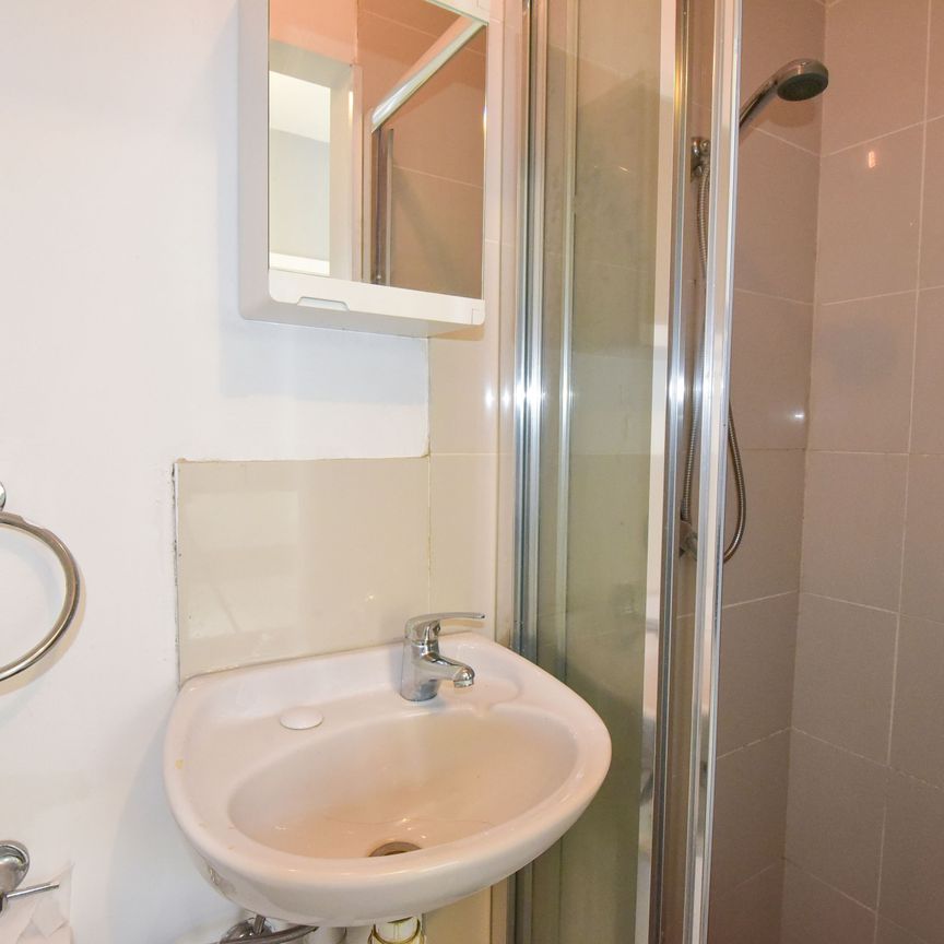 Studio In Sought After Street - Photo 1