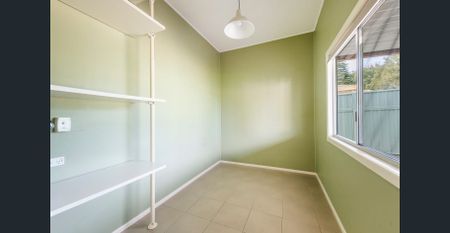 Well-Kept 3-Bedroom Home with Shed & Sunroom in Quiet Location - Photo 2