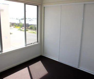 “Bright, Fresh, Stunning Townhouse with Open Plan living!” - Photo 5