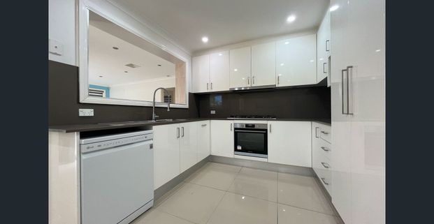 Spacious Four Bedroom Home! - Photo 1