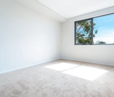 “NEAR NEW MODERN TWO BEDROOM APARTMENT” - Photo 2