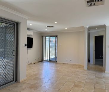 Charming, Secure 4-Bedroom, 2-Bathroom Home, Featuring Triple Garag... - Photo 2