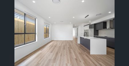 Brand New 4 Bedroom Home with Dual Masters in Covella Estate - Photo 5