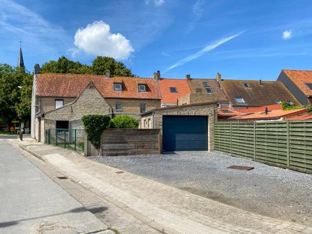 Charmante woning met 4 slaapkamers, tuin en ruime garage. - Photo 2
