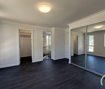 Brand New 4 Bedroom Home, Located in Austral! - Photo 1