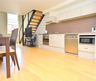 Furnished Loft-Style Living in the Heart of the CBD - Photo 4
