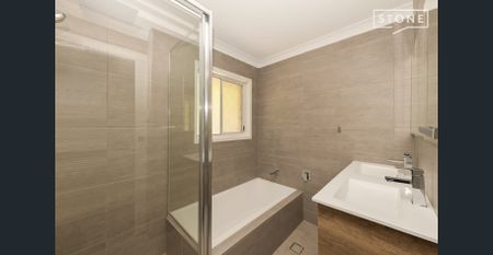 Fresh, Spacious Lakeside Home – 5 Bedrooms | 2 Bathrooms | New Kitchen - Photo 5