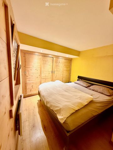 Gemütliche Wohnung mit viel Holz und alpinem Charm - Foto 2