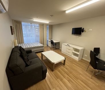 MODERN FURNISHED STUDIO APARTMENT - Photo 1