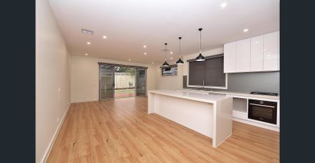 NEAR NEW SPACIOUS FOUR BEDROOM HOME WITH ALL THE NECESSARY INCLUSIONS! - Photo 5