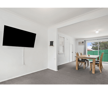 Spacious Three-Bedroom Home with Multiple Living Areas - Photo 2