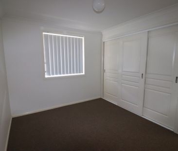 Easy Care family home for rent - Photo 1