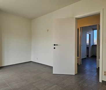 Vernieuwd en licht dakappartement in het centrum - Foto 5