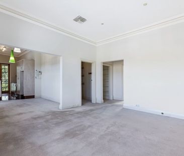 Top-Floor Living with Park Views & Incredible Convenience - Photo 2