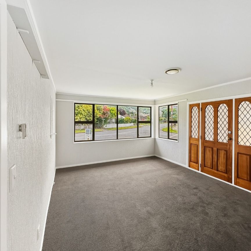 Tidy 3-Bedroom Home with Double Garage – Central Taita - Photo 1