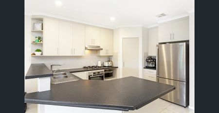 Modern Family Home with Two Living Areas & Gorgeous Outdoor Space - Photo 5