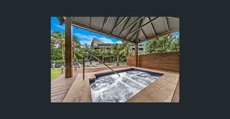 Idyllic Lifestyle in Resort-Syle Emerald Park Complex - Photo 2