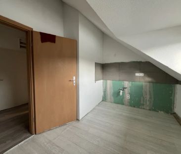 Charmante Dachgeschosswohnung direkt in der Gevelsberger City - Photo 5