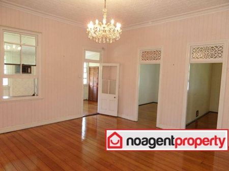 Spacious Four-Bedroom Queenslander with Timeless Charm in Clayfield - Photo 5