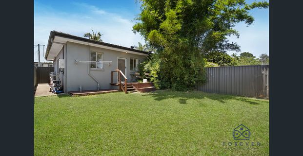 Modern Comfort Meets Convenient Living in the Heart of Daisy Hill! - Photo 1