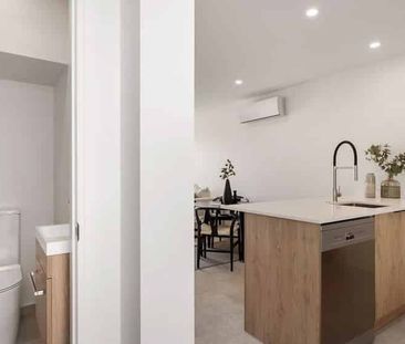 Beautifully Designed Two Bedroom Townhouse! - Photo 3
