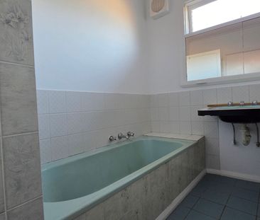 Spacious 3-Bed Home with Large Backyard - Photo 6