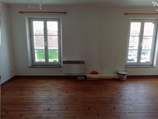 Un appartement au 1er étage dans le centre du bourg - Photo 1