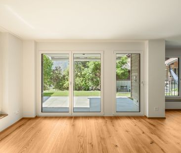 Gartenwohnung mit gedecktem Sitzplatz und Sonnenmarkise - Erstbezug - Photo 2
