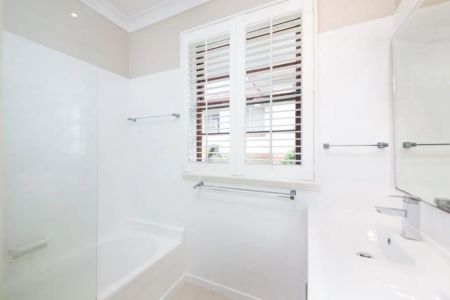 Elegant Stucco Double Brick Home with Character and Modern Comfort - Photo 3