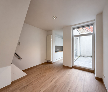 Gerenoveerde 3-slaapkamerwonig met stadskoer te huur in Gent - Photo 1