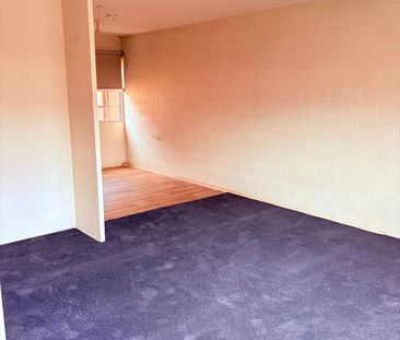 Two-storey, two-bedroom unit - Photo 3