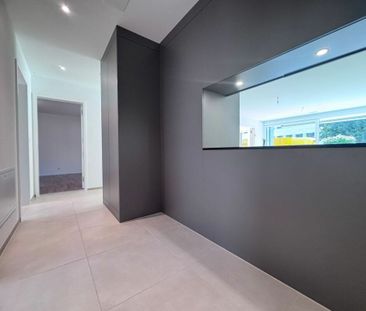 Moderne 4.5-Zimmer-Wohnung, 1. OG, mit Loggia und Wintergarten - Foto 4