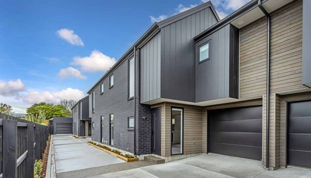 New Three Bedroom Townhouse with Carpeted Garage - Photo 1