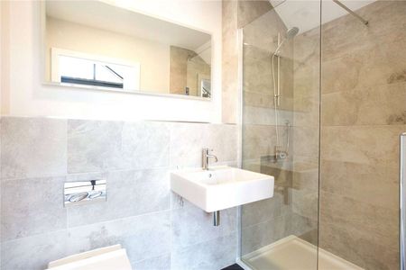 A two bedroom home with a private balcony, under croft parking for two cars and store, located in the heart of Salisbury - Photo 5