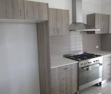 Executive Home with Fully Ducted A/C - Photo 1