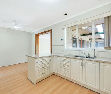 The Perfect Family Home with a Spacious Yard! - Photo 1