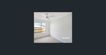 Situated on a corner block in the growing suburb of Park Ridge, this well-presented low set home offers comfort, convenience and easy living. - Photo 2