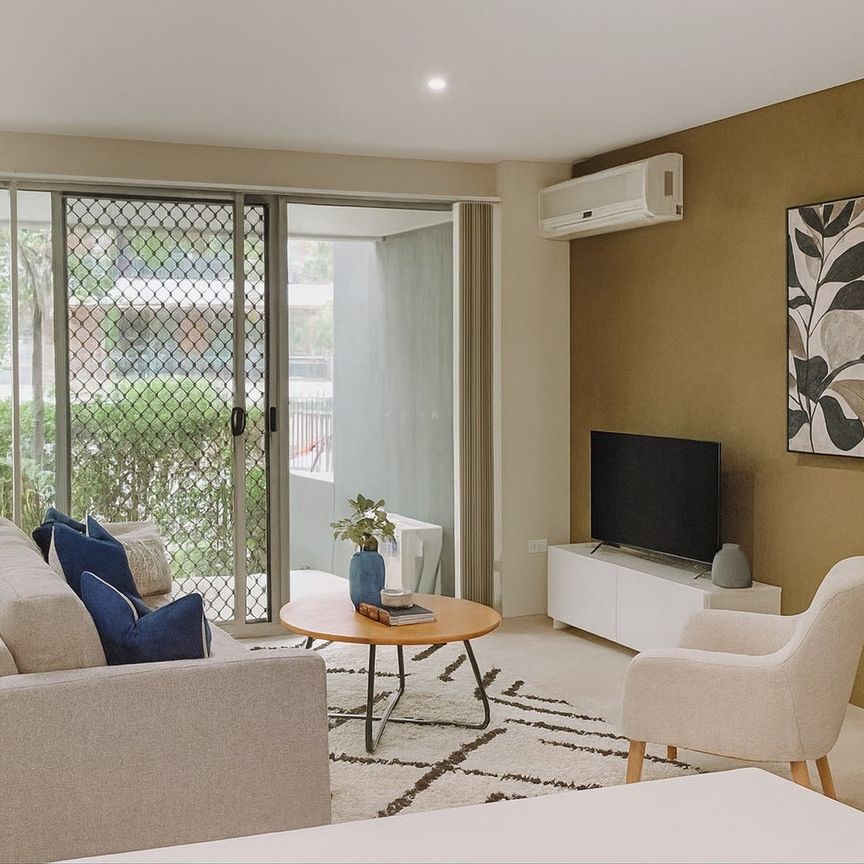 MODERN 2 BEDROOM APARTMENT FEATURING GRASSED YARD - Photo 1