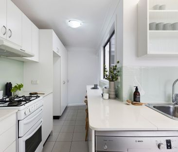 Classic terrace charm in a vibrant village setting - Photo 5