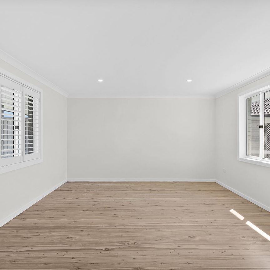EASY-CARE COASTAL LIVING IN A CONVENIENT WARILLA SETTING - Photo 1