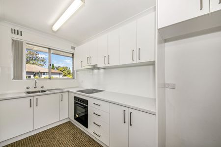 Air-Conditioned One Bedroom Unit with Built-in Wardrobe and Single Car Space! - Photo 3