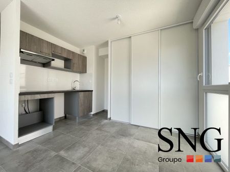 T3 AVEC BALCON ET UN PARKING COUVERT - Photo 4