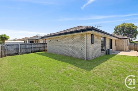 Stylish & Spacious Family Home in Prime Collingwood Park Location - Photo 4