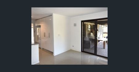 Modern Family Living with Solar, Smart Features & Massive Parking Capacity - Photo 5