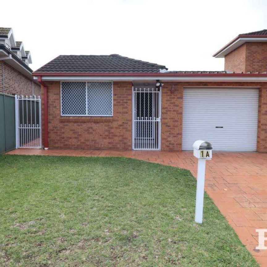 ELITE DUPLEX WITH GARAGE - Photo 1