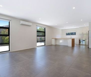 SPACIOUS AND CENTRAL FOUR BEDROOM TOWNHOUSE - Photo 1