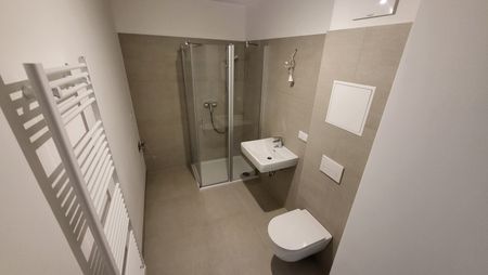 Smarte 2-Zimmer-Wohnung mit Hofterrasse: Hochwertige Ausstattung + Ausgezeichnetes Raumkonzept - Photo 5