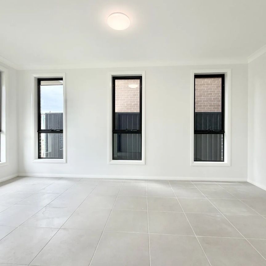 Brand-New, Effortless Modern Living in a Light-Filled Family Home - Photo 1