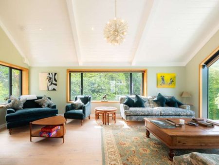 A substantial and beautifully presented four bedroom house, set in an elevated position with valley views. Driveway, large garage workshop with a lift to the li - Photo 3